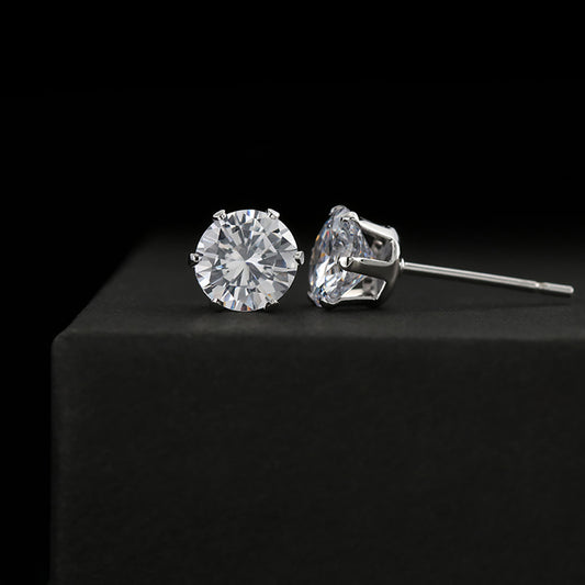 A pair of ShineOn Fulfillment 6mm stud earrings featuring Cubic Zirconia Earrings on a black background.