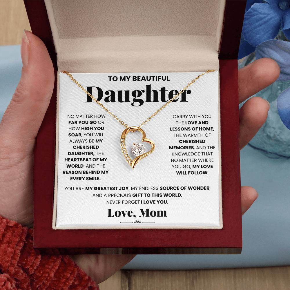 A My Cherished Daughter - Forever Love Necklace, specially designed for a beloved daughter, is nestled inside an exquisite ShineOn Fulfillment gift box.