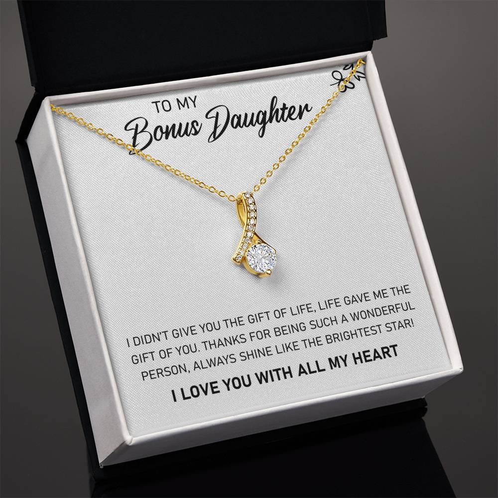 A gift box with the To My Bonus Daughter, Always Shine Like The Brightest Star - Alluring Beauty Necklace by ShineOn Fulfillment inside.