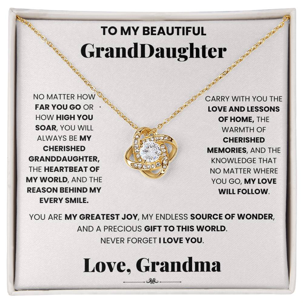 A Cherished Granddaughter Grandma - Love Knot Necklace pendant adorned with cubic zirconia crystals that reads to my beautiful granddaughter, by ShineOn Fulfillment.
