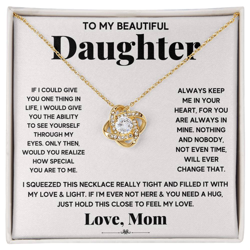 A To My Beautiful Daughter, Just Hold This To Feel My Love - Love Knot Necklace gift box featuring a beautiful necklace with an adjustable chain length and adorned with sparkling cubic zirconia crystals, specially designed for my beloved daughter by ShineOn Fulfillment.