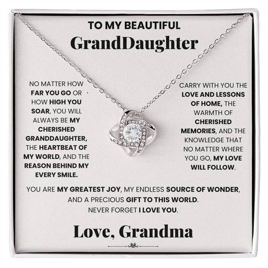 A Cherished Granddaughter Grandma - Love Knot Necklace with a pendant adorned with cubic zirconia crystals, specially designed by ShineOn Fulfillment for my beautiful granddaughter.
