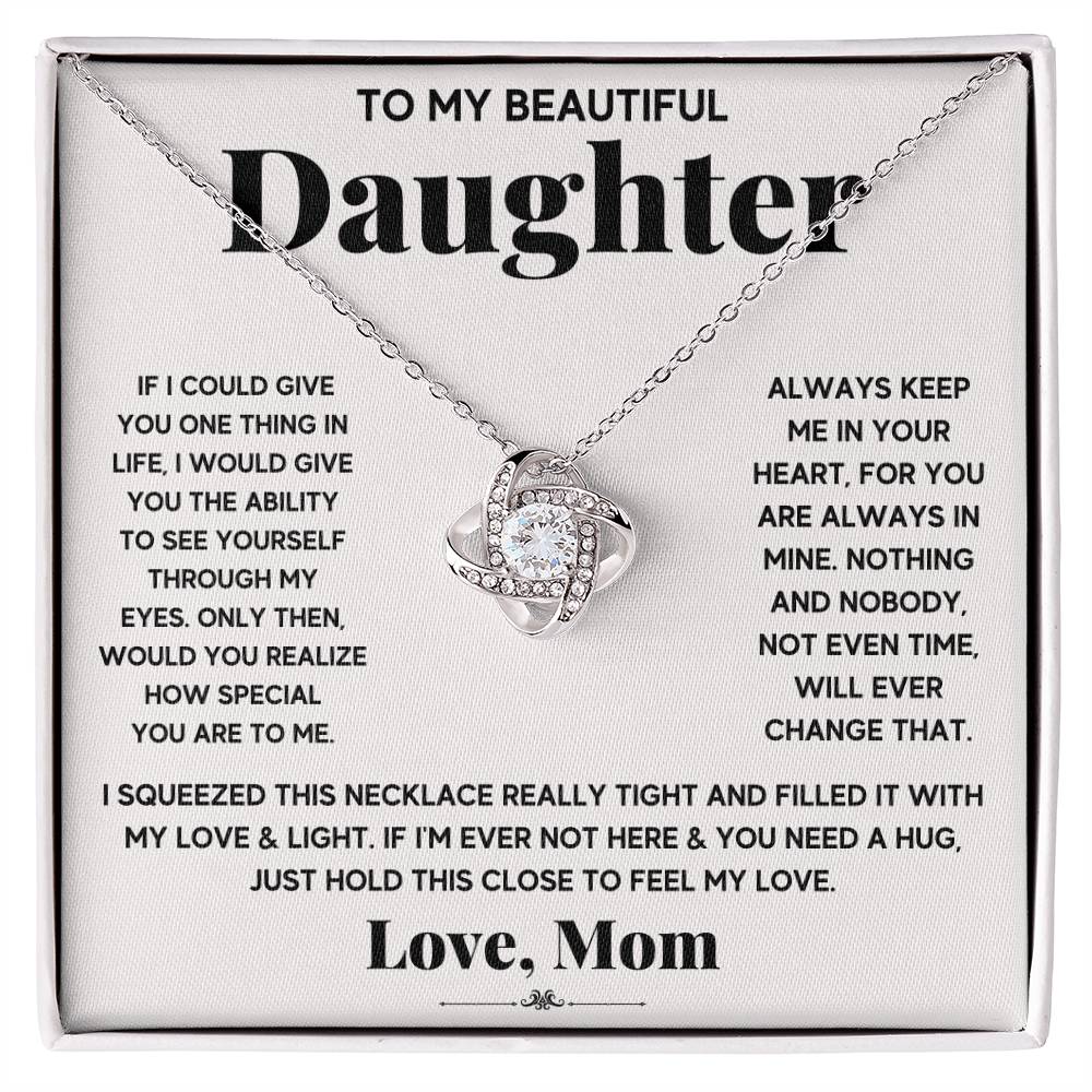A beautiful To My Beautiful Daughter, Just Hold This To Feel My Love - Love Knot Necklace by ShineOn Fulfillment, with cubic zirconia crystals, featuring an adjustable chain length, enclosed in a box.