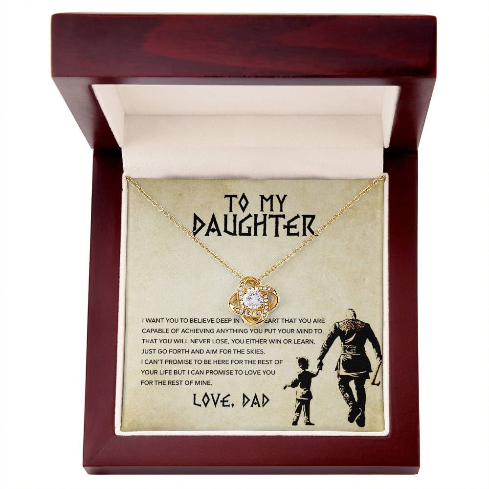 A "To My Daughter, You Will Never Lose - Love Knot Necklace" pendant with the words to my daughter encrusted with cubic zirconia crystals inside a wooden box, made by ShineOn Fulfillment.