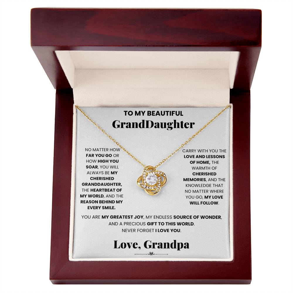 A Cherished Granddaughter Grandpa - Love Knot Necklace pendant encrusted with cubic zirconia crystals, presented in a stylish wooden box by ShineOn Fulfillment.