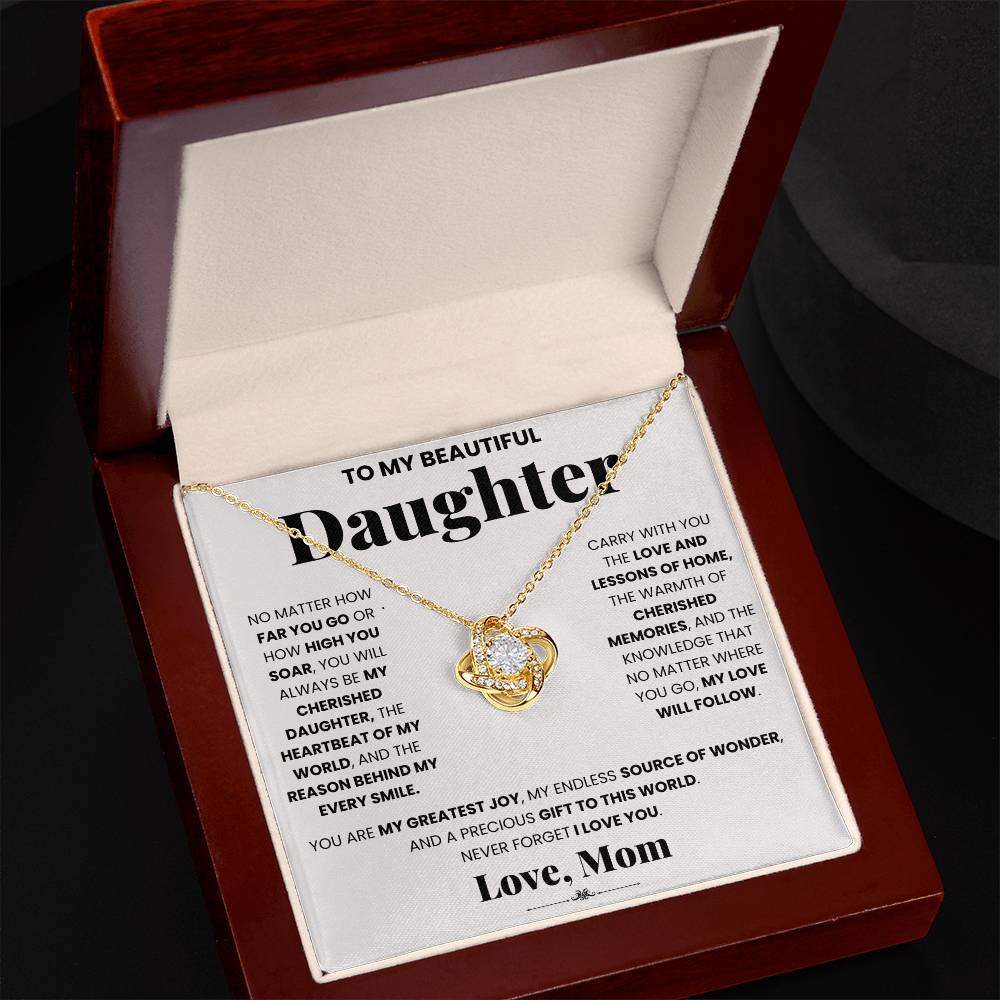 This gift box contains a ShineOn Fulfillment 10_1 - Love Knot Necklace adorned with cubic zirconia crystals, specially designed for my daughter.