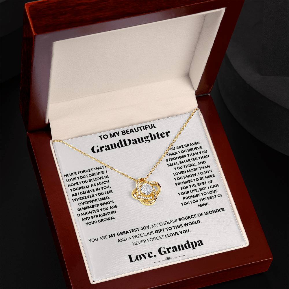 A box with a Love forever grandpa - Love Knot Necklace pendant inside, adorned with cubic zirconia crystals.