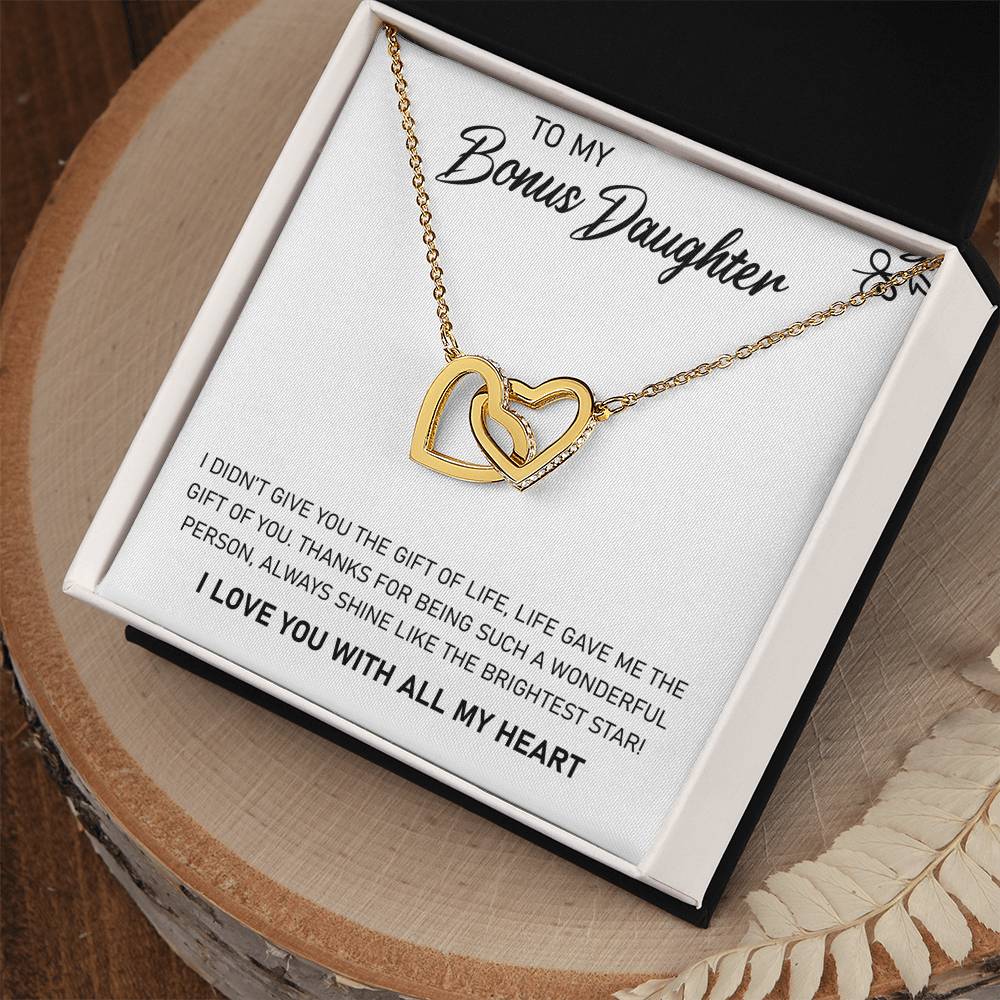 A To My Bonus Daughter, Always Shine Like The Brightest Star - Interlocking Hearts Necklace in a box by ShineOn Fulfillment.