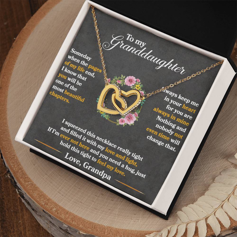A heartfelt gift box with the "To My Granddaughter, Hold This Tight To Feel My Love - Interlocking Hearts Necklace" by ShineOn Fulfillment, adorned with cubic zirconia crystals, featuring an endearing inscription that reads "I love my granddaughter.