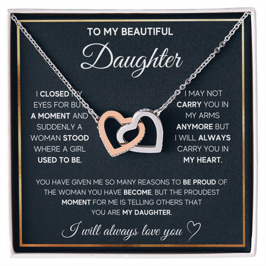 A special "To My Daughter, I Will Always Carry You In My Heart - Interlocking Hearts Necklace" by ShineOn Fulfillment, adorned with cubic zirconia crystals.