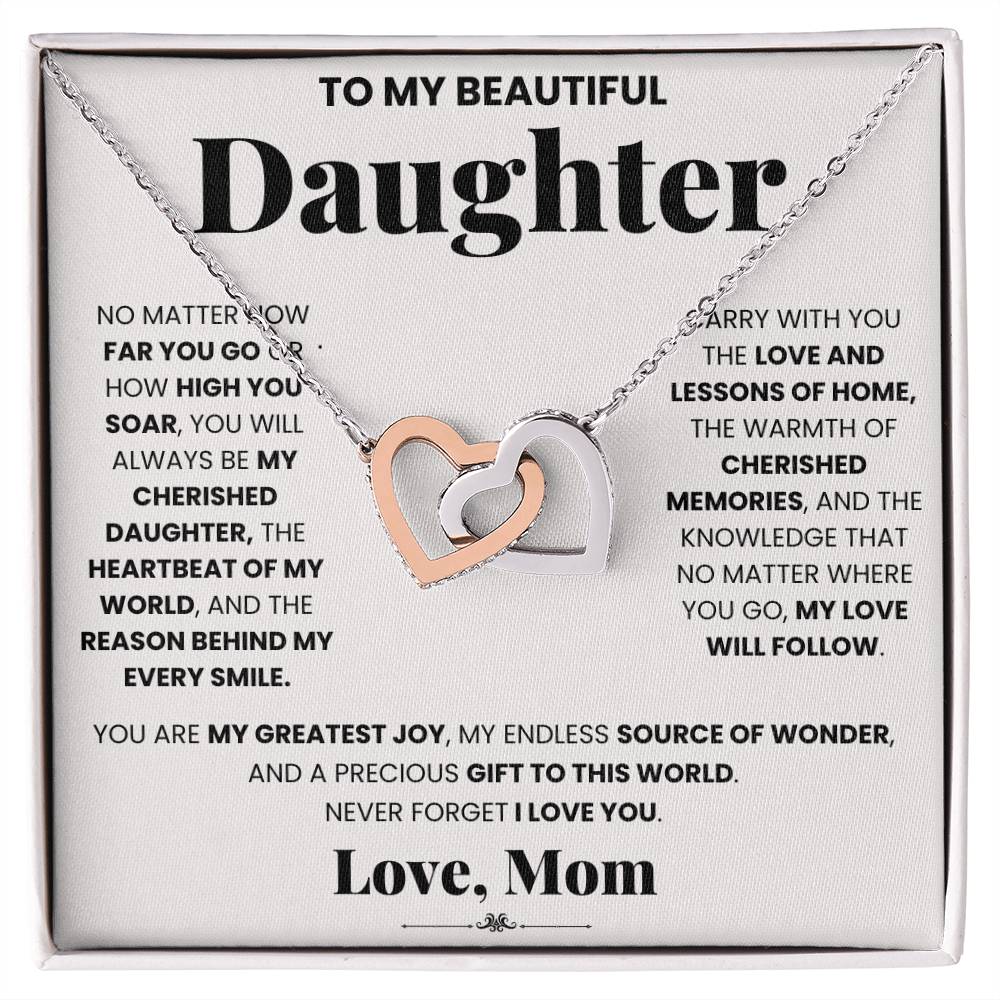 A My Cherished Daughter - Interlocking Hearts necklace from ShineOn Fulfillment inscribed with the words "to my beautiful daughter".