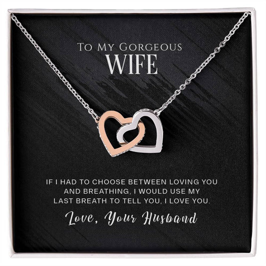 Surprise that special someone with a To My Wife, I Love You - Interlocking Hearts Necklace by ShineOn Fulfillment. The necklace is delicately engraved with the loving message "to gorgeous my wife." This gift box will surely impress.