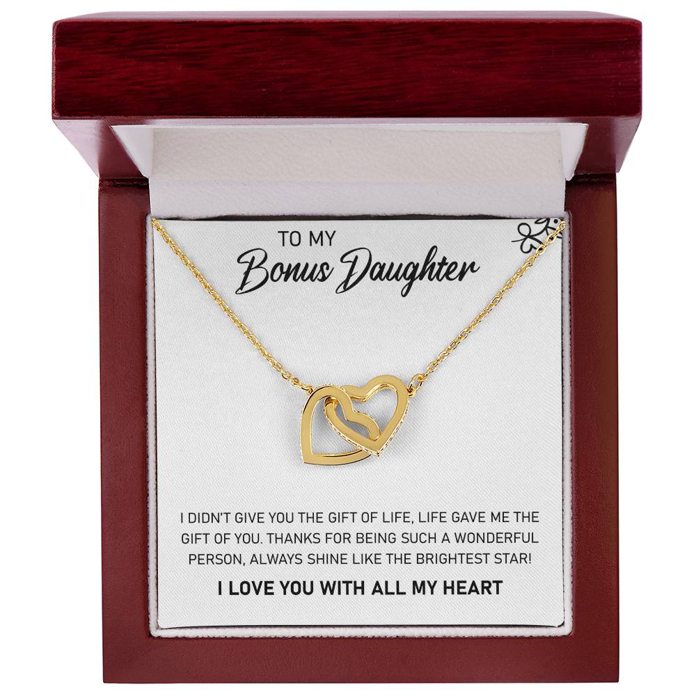 I am thrilled to present my daughter with a ShineOn Fulfillment special gift box filled with love. Inside, she will discover a stunning To My Bonus Daughter, Always Shine Like The Brightest Star - Interlocking Hearts Necklace accompanied by a heartfelt message.