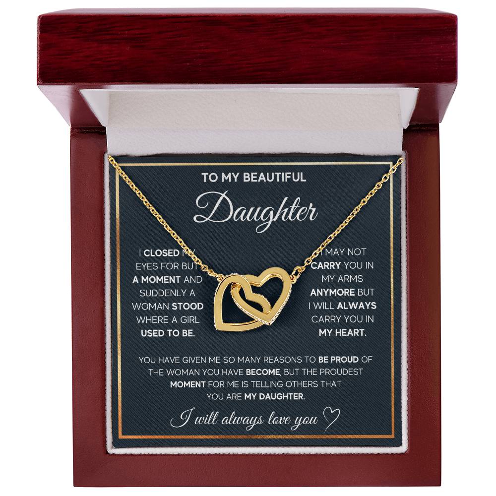 A special gift box with a "To My Daughter, I Will Always Carry You In My Heart - Interlocking Hearts Necklace" by ShineOn Fulfillment, adorned with cubic zirconia crystals, beautifully engraved with the message "to my beautiful daughter.