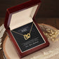 This wooden box holds ShineOn Fulfillment's "To My Wife, I Love You - Interlocking Hearts Necklace" adorned with sparkling cubic zirconia crystals.