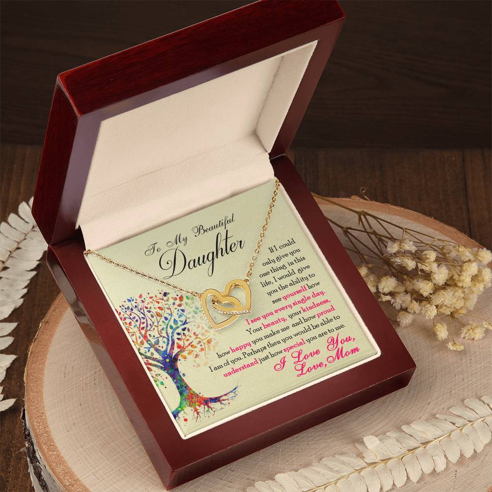 This gift box features an image of a tree and includes a "To My Beautiful Daughter, You Are Special To Me - Interlocking Hearts Necklace" with cubic zirconia crystals. The necklace also has an adjustable length for a perfect fit. (Brand: ShineOn Fulfillment)
