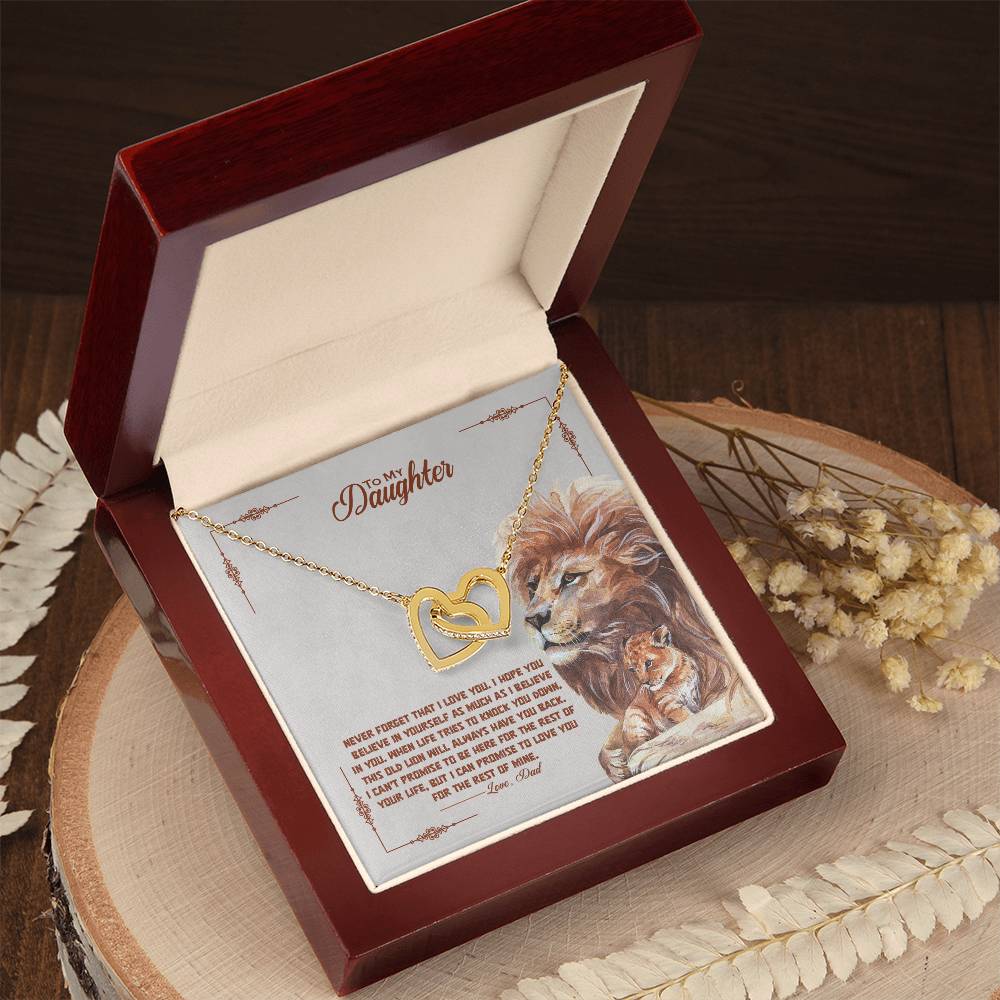 A wooden box with a To My Beautiful Daughter, I Promise To Love You For The Rest Of My Life - Interlocking Hearts Necklace by ShineOn Fulfillment in it, adorned with hearts.