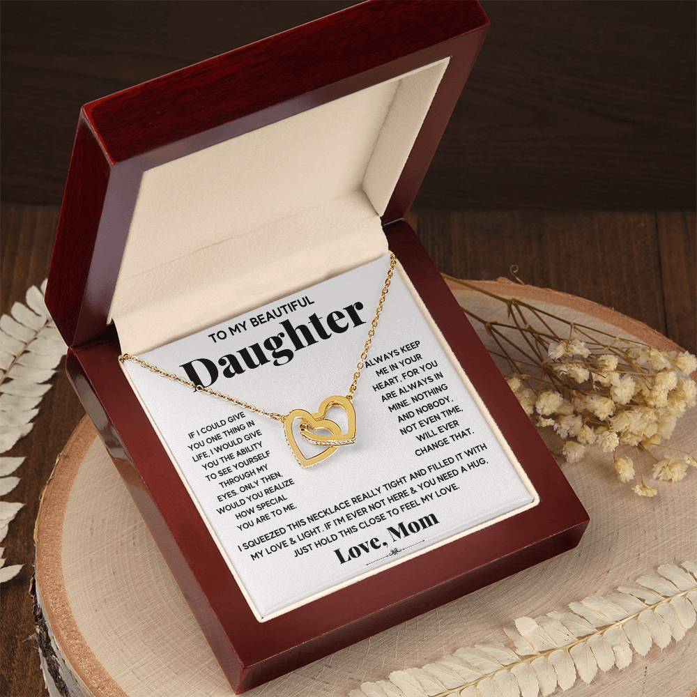 An anniversary gift box featuring the To My Beautiful Daughter, Just Hold This To Feel My Love - Interlocking Hearts Necklace by ShineOn Fulfillment and a heartfelt gift card expressing love.