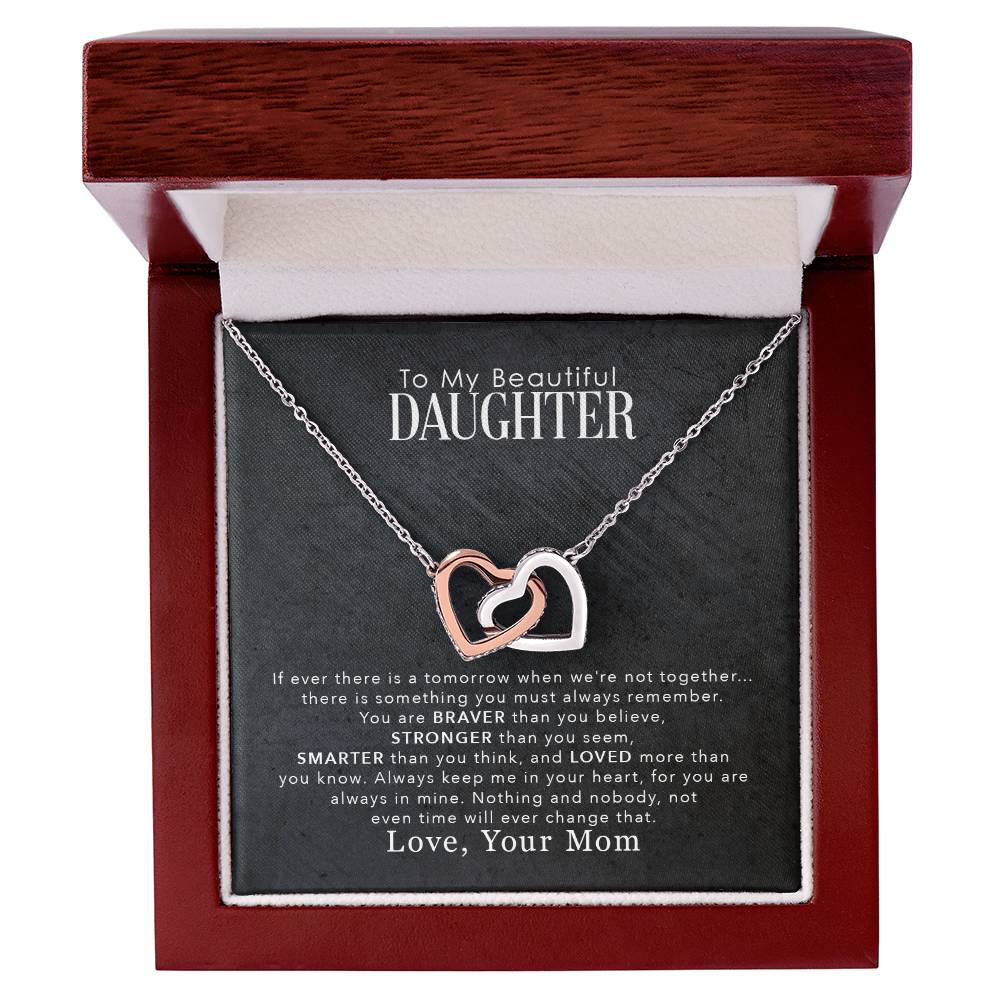 An exquisite "To My Beautiful Daughter, You Are Braver Than You Believe" - Interlocking Hearts Necklace from ShineOn Fulfillment, adorned with cubic zirconia crystals, delicately presented in a beautiful box.
