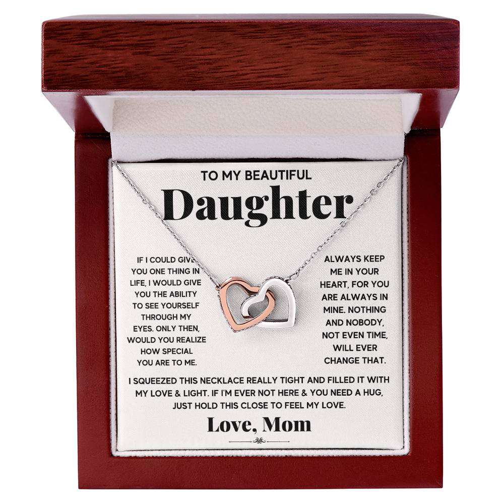A beautiful necklace, expressing love, enclosed in a ShineOn Fulfillment gift box: To My Beautiful Daughter, Just Hold This To Feel My Love - Interlocking Hearts Necklace.