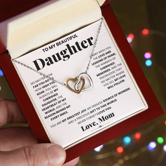 A heartwarming gift box filled with love, containing the My Cherished Daughter - Interlocking Hearts necklace from ShineOn Fulfillment.