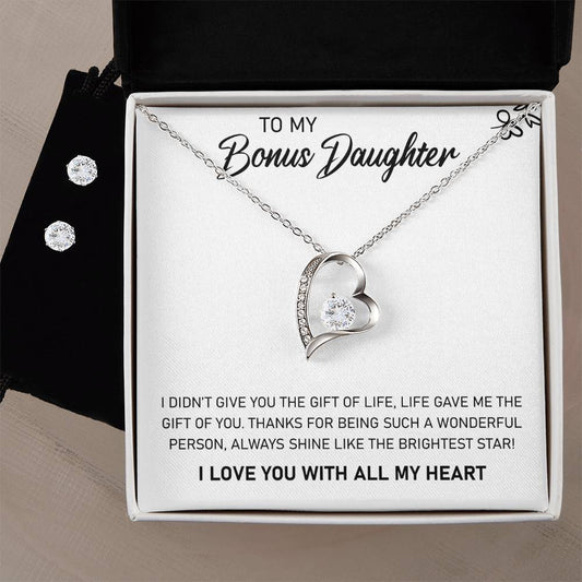 A sparkling jewelry gift box with a To My Bonus Daughter, Always Shine Like The Brightest Star - Forever Love Necklace from ShineOn Fulfillment and a gift card.