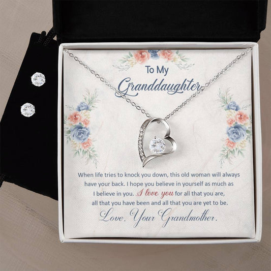 A dazzling sparkle gift box with a To My Granddaughter, This Old Woman Will Always Have Your Back - Forever Love Necklace And Earrings set by ShineOn Fulfillment.
