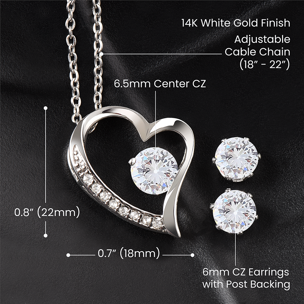 A dazzling To My Granddaughter, This Old Woman Will Always Have Your Back - Forever Love Necklace And Earrings set adorned with Cubic Zirconia by ShineOn Fulfillment.