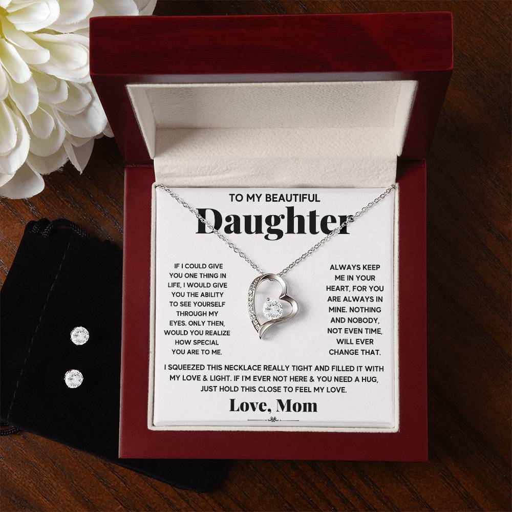A gift box with a To My Beautiful Daughter, Just Hold This To Feel My Love - Forever Love Necklace and earrings from ShineOn Fulfillment for a daughter.