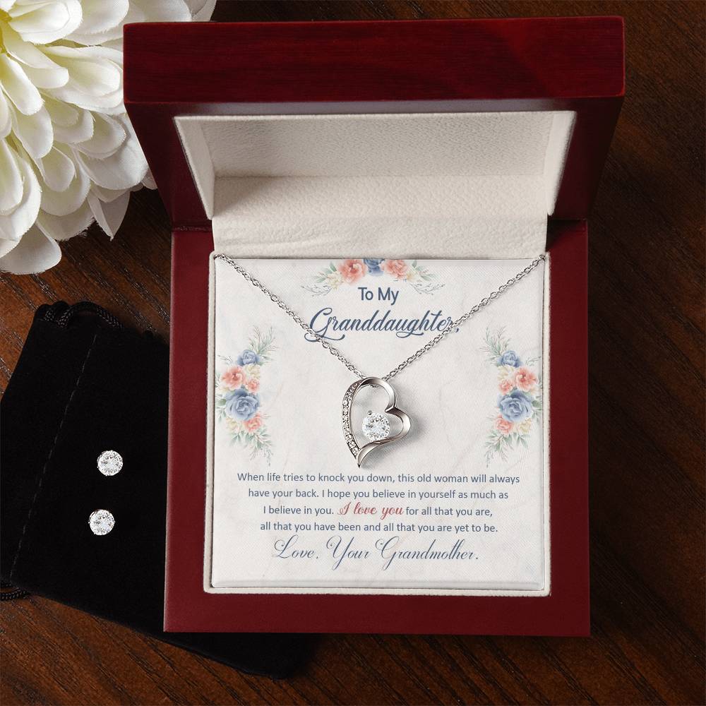 A gift box with a "To My Granddaughter, This Old Woman Will Always Have Your Back - Forever Love Necklace And Earrings" from ShineOn Fulfillment for a grandma.