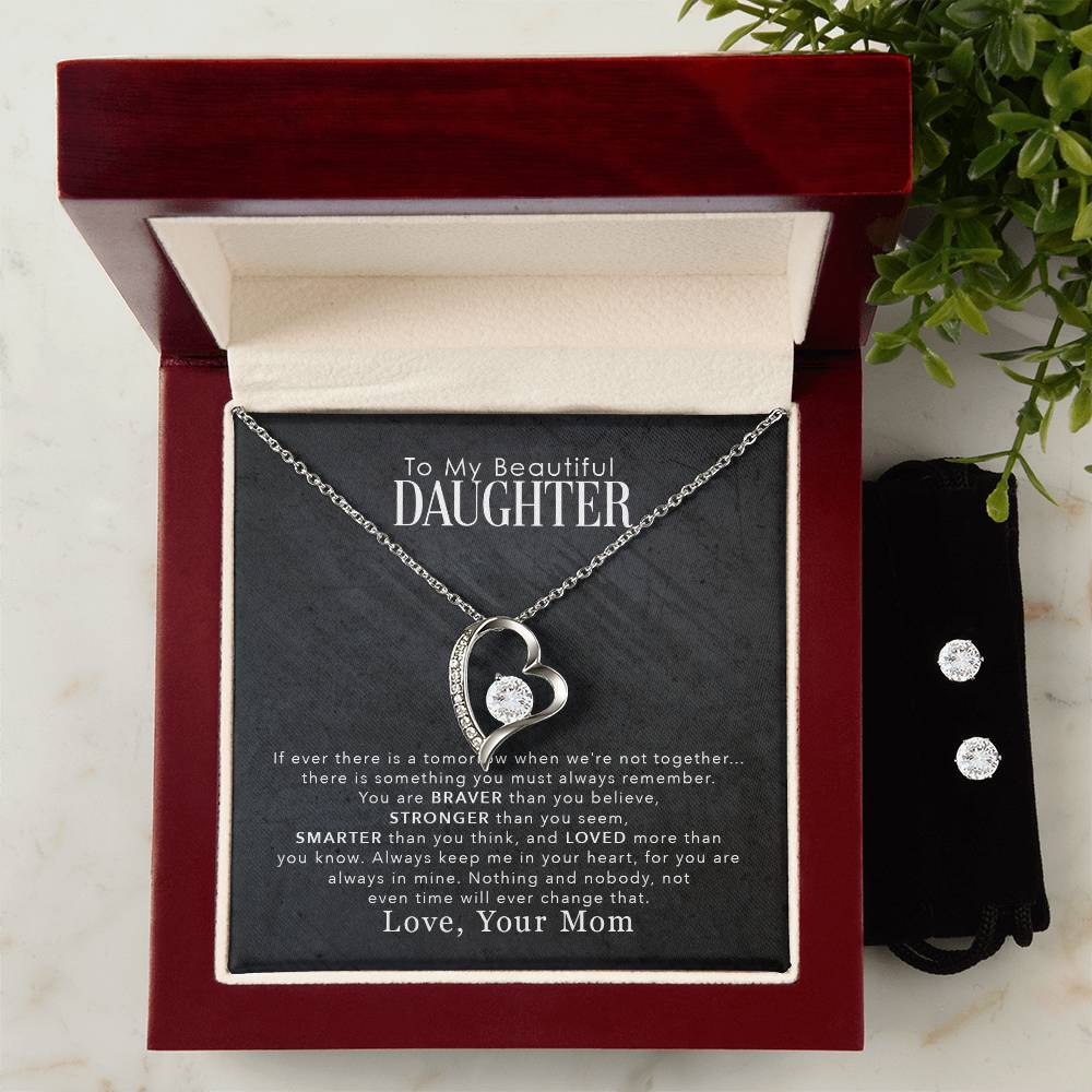 A gift box with a To My Beautiful Daughter, You Are Braver Than You Believe - Forever Love Necklace from ShineOn Fulfillment and a gift card.