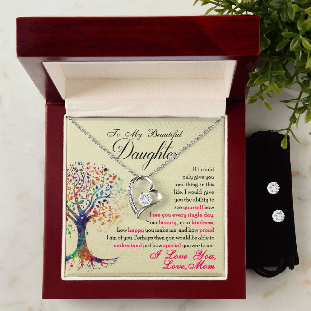 This sparkling gift box includes a To My Beautiful Daughter, You Are Special To Me - Forever Love Necklace from ShineOn Fulfillment, showcasing a beautiful necklace that says "I love you" to my daughter.