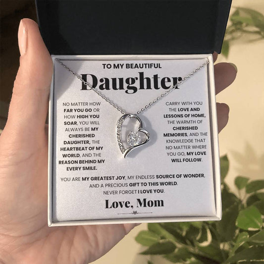 This gift box includes a stunning My Cherished Daughter - Forever Love Necklace by ShineOn Fulfillment, featuring a heart pendant beautifully adorned with CZ crystals. The necklace is inscribed with the heartfelt message "To my beautiful daughter.