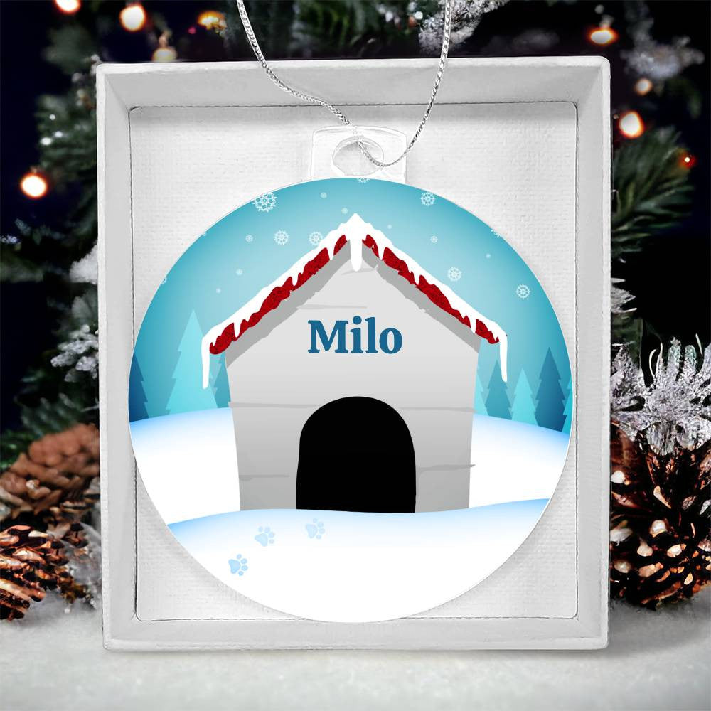 The AnywherePOD "Honor Your Pup This Holiday with a Personalized Dog Name Christmas Ornament" features a customized acrylic ornament of a snowy doghouse with a red roof and your pet's name, like "Milo," prominently displayed. Set against a tranquil winter landscape complete with pine trees and a cheerful Christmas tree, this high-quality acrylic piece is perfect for creating unique holiday keepsakes.