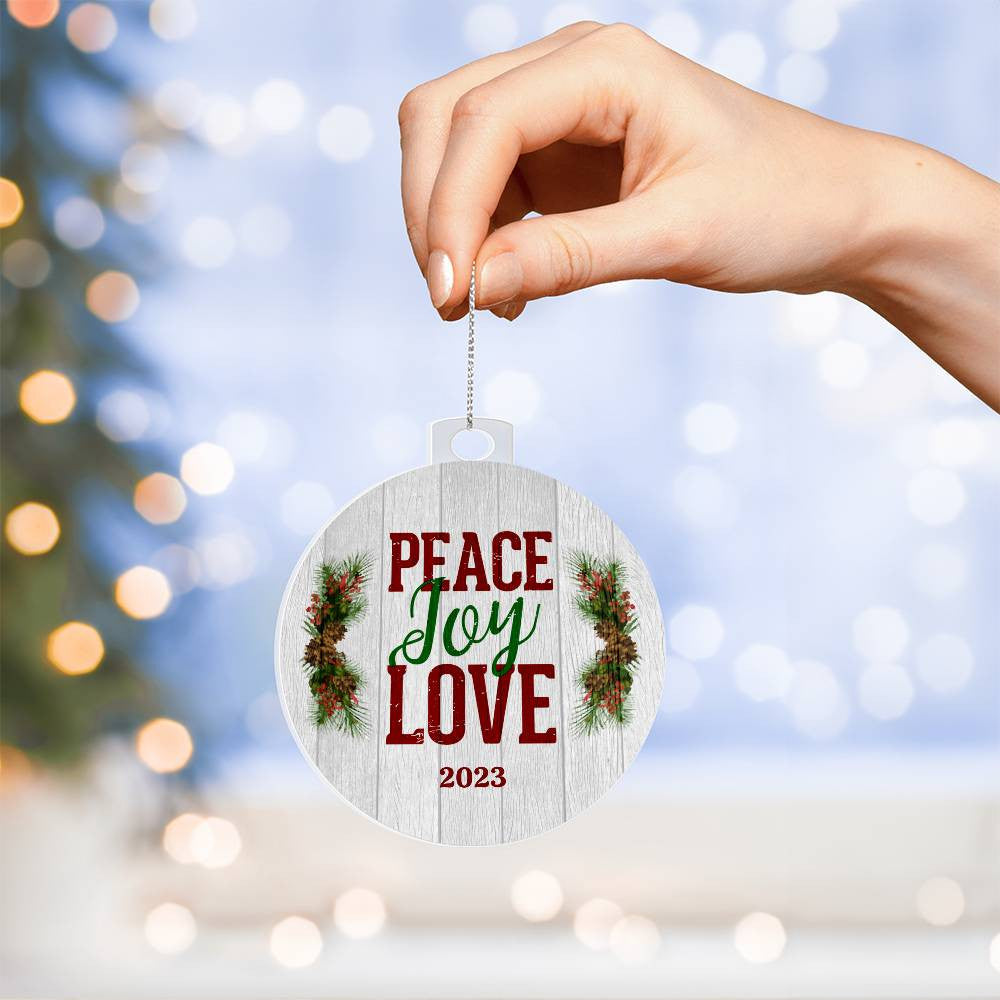 Peace, joy, and love come alive with the AnywherePOD Peace, Joy, Love Christmas Ornament. Crafted from durable acrylic, it is the perfect gift to spread holiday cheer. Hang it on your tree or give it as a present.