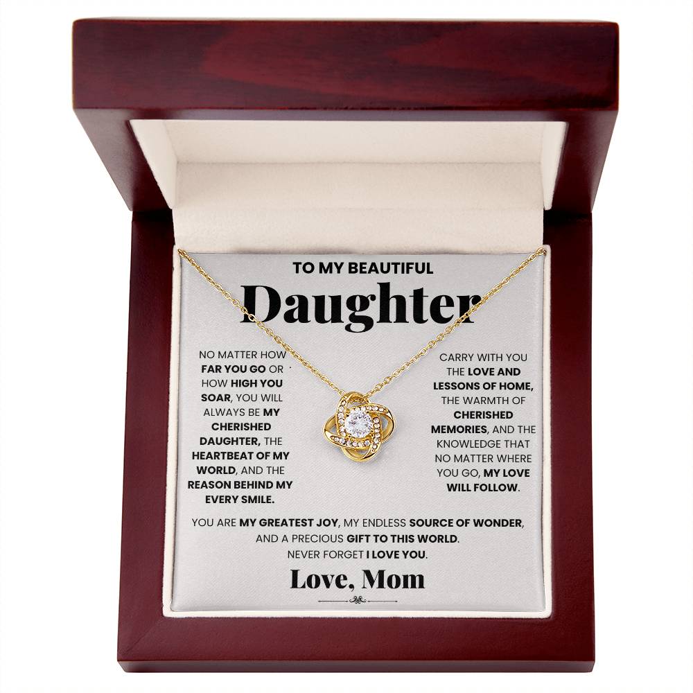 A stunning My Cherished Daughter - Love Knot Necklace enclosed in a beautifully crafted gift box, specially created for my extraordinary daughter by ShineOn Fulfillment.