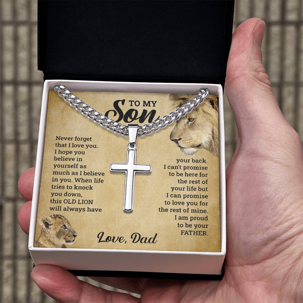 A ShineOn Fulfillment gift box with the "To My Son - This Old Lion Has Your Back" necklace and a cross in it, symbolizing love for a son.