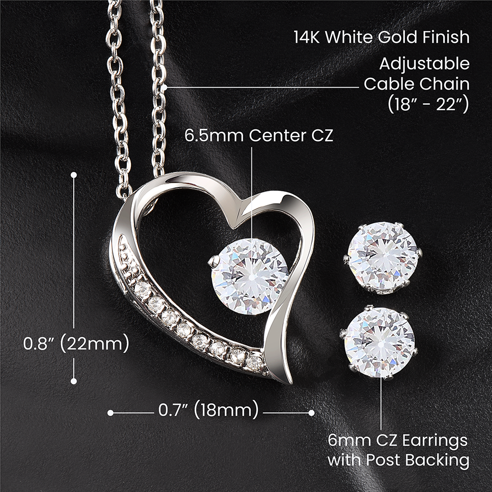 Explore the "To My Wife, I Just Want To Be Your Last Everything - Forever Love Necklace & Earring Set" by ShineOn Fulfillment. This enchanting piece features a heart-shaped pendant with a 14K white gold finish and a dazzling 6.5mm center cubic zirconia, accented by smaller CZ stones along the sides. The necklace is paired with an adjustable cable chain (18"-22") and includes matching earrings with 6mm cubic zirconia studs and post backings.