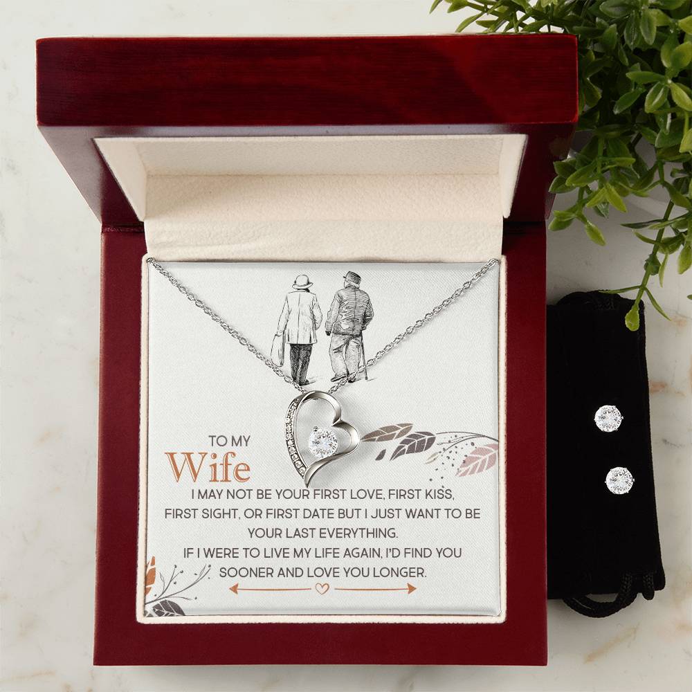 The "To My Wife, I Just Want To Be Your Last Everything - Forever Love Necklace & Earring Set" by ShineOn Fulfillment is elegantly showcased in a red velvet box. Inside, a heartfelt message to your wife is paired with illustrations of an elderly couple holding hands. The set includes a stunning Forever Love Necklace featuring a diamond pendant and is perfectly complemented by a 14k White Gold Finish Cubic Zirconia Earring Set, completing this enchanting presentation.