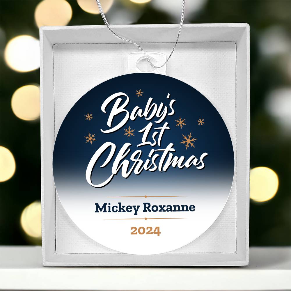 ShineOn Fulfillment's "Twinkling Joy: Baby's First Magical Christmas" ornament is a personalized acrylic keepsake featuring the inscription "Baby's 1st Christmas" with the name "Mickey Roxanne" and the year "2024" in elegant gold. It showcases a background gradient from dark blue to white, adorned with stars encircling the text, while a softly blurred Christmas tree enhances its charm.