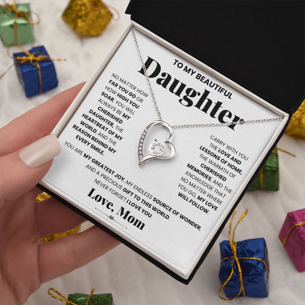 A My Cherished Daughter - Forever Love Necklace engraved with 'love my daughter' inside a gift box by ShineOn Fulfillment.
